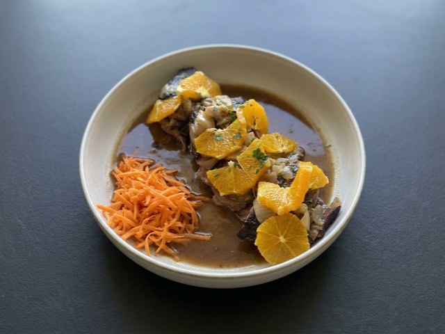 Duck with orange — the generated image